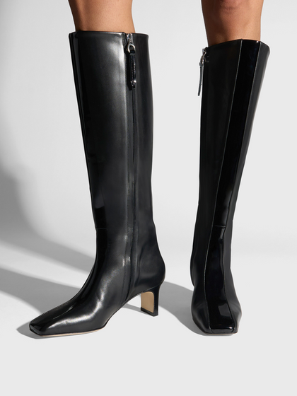 Aeyde | Bita Stripe Leather Knee High Boots for Women | Black Calf/Patent | Square Toe | Mid Heel | On Feet