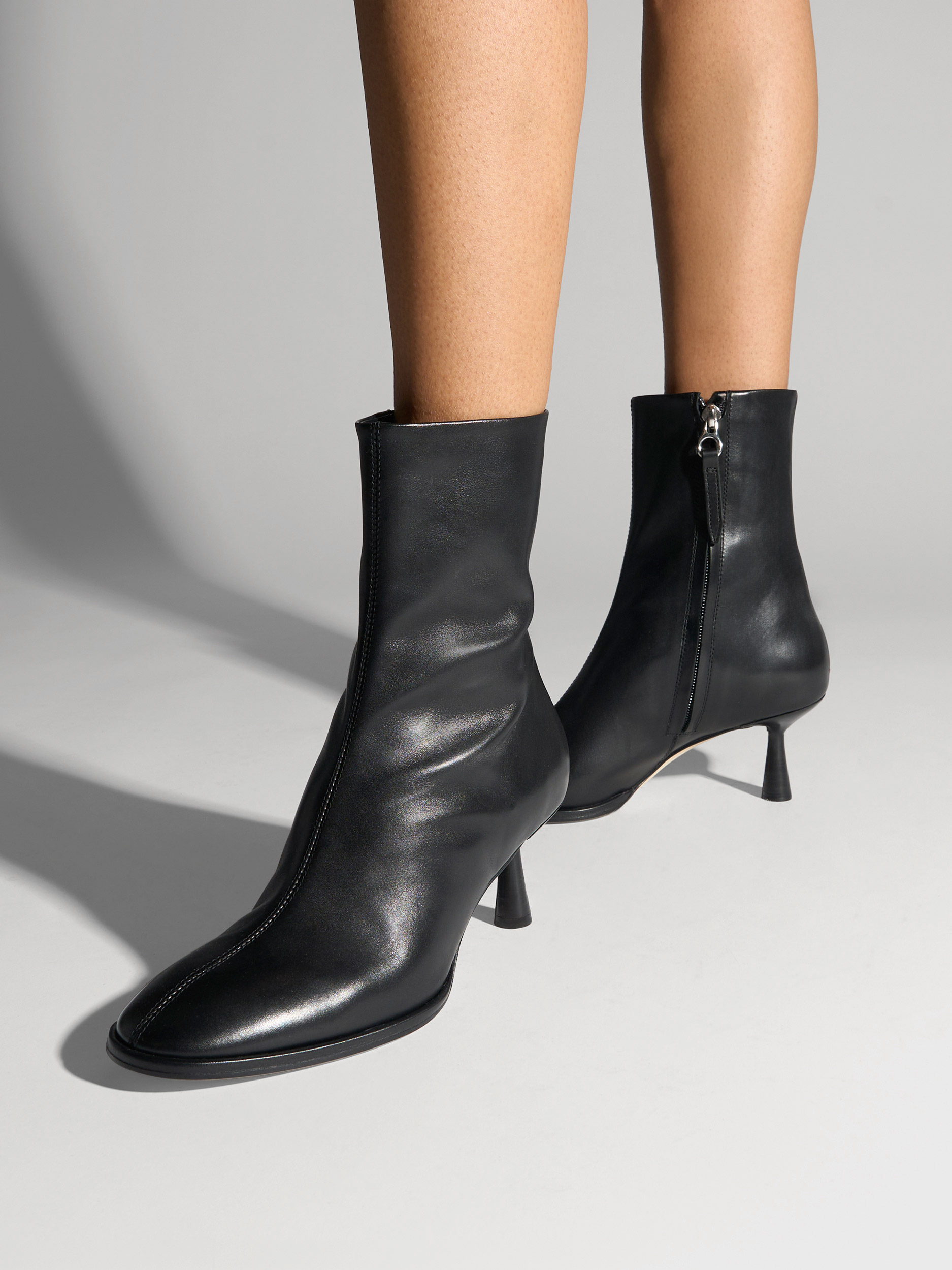 Aeyde | Dorothy Leather Ankle Boots Leather Ankle Boots for Women | Black Calf | Round Toe | Mid Heel | On Feet
