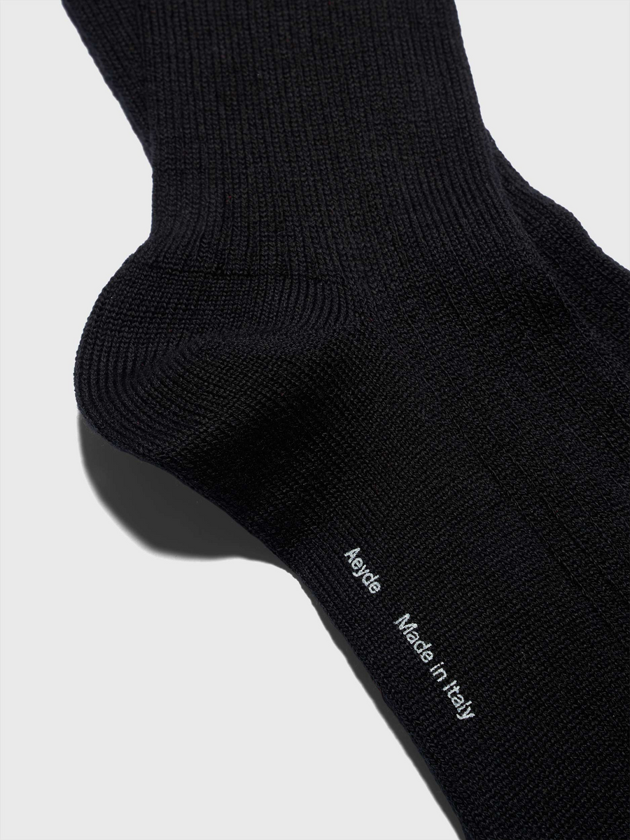 Aeyde | Jonah Wool Socks for Women | Black Wool | Luxury Materials | Handmade in Italy | Material Details