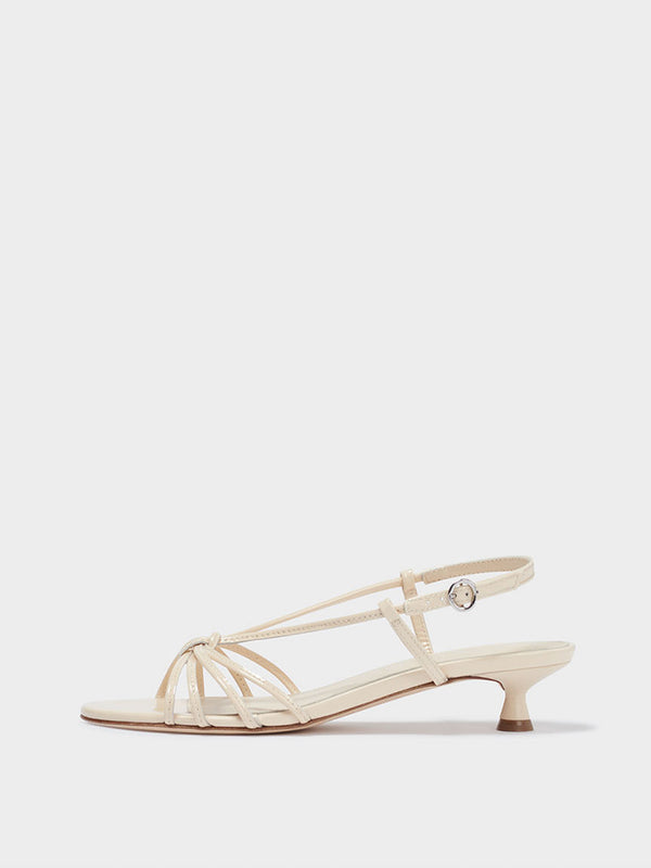 Aeyde | Rhonda Leather Heeled Sandals for Women | Creamy Patent | Round Toe | Low Heel | Side View [x=50,y=85]