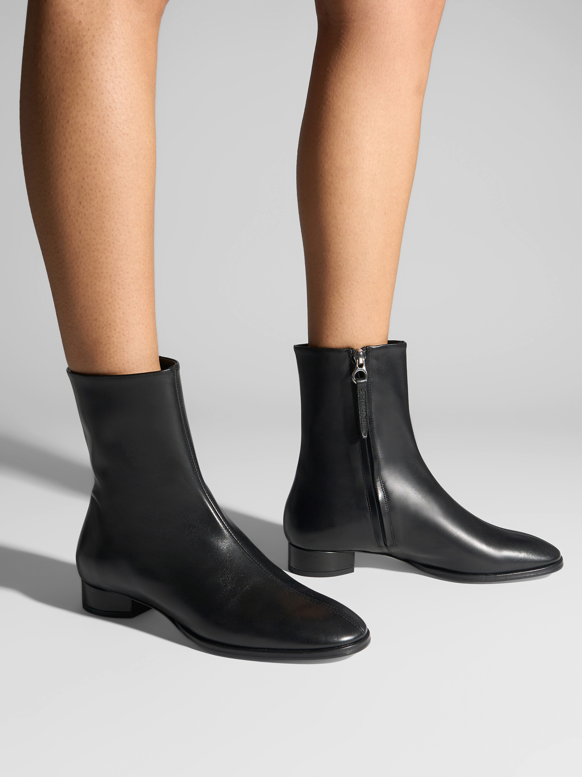 Aeyde | Roisin Leather Ankle Boots Leather Ankle Boots for Women | Black Calf | Round Toe | Low Heel | On Feet