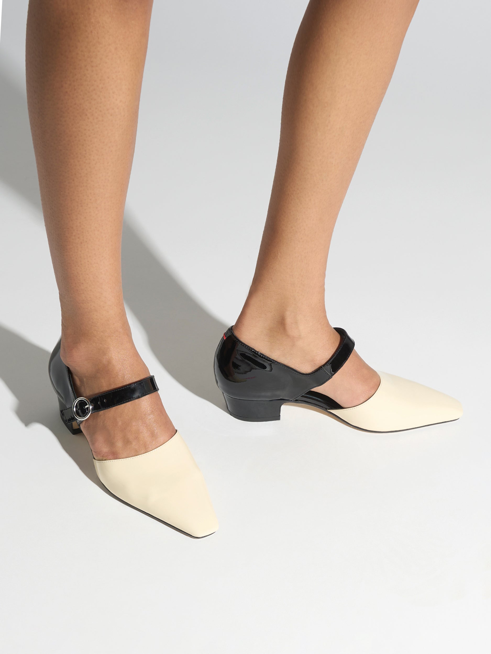 Aeyde | Yara Leather Pumps for Women | Black/Creamy Patent | Square Toe | Mid Heel | On Feet