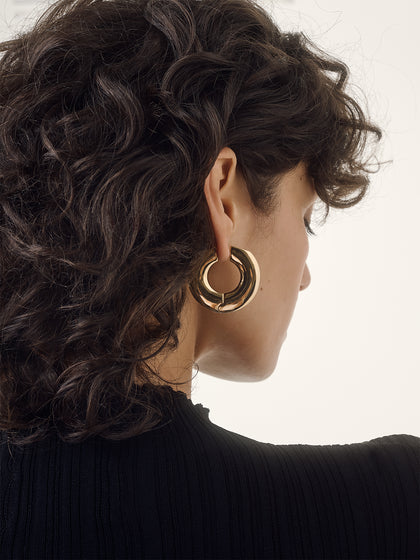 Aeyde | Ada Large 18kt Gold-Plated Hoop Earrings for Women | Luxury Materials | Handmade in Italy | On Model